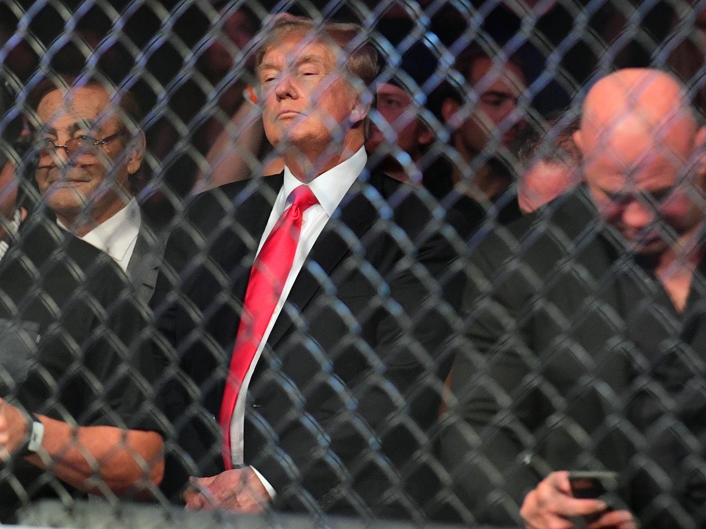 Former US President Donald Trump attends UFC 264 at T-Mobile Arena.