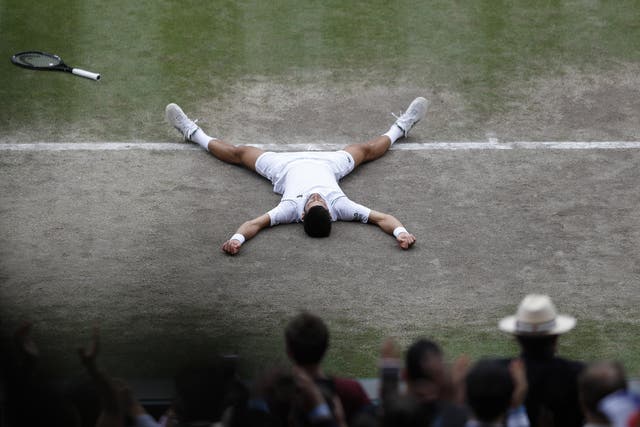 <p>Novak Djokovic celebrates winning Wimbledon</p>