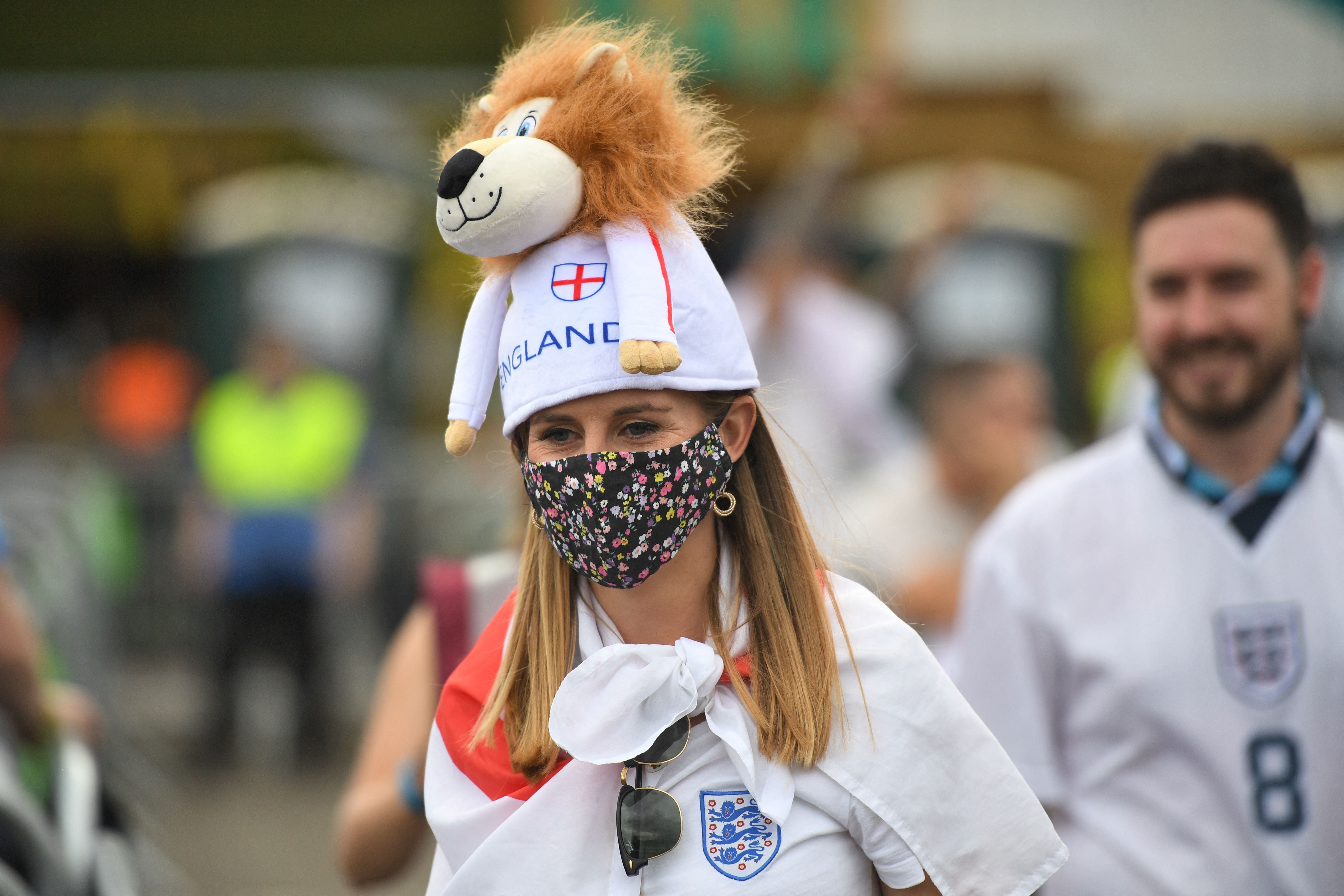 An England supporter arrives to watch England v Italy on 11 July