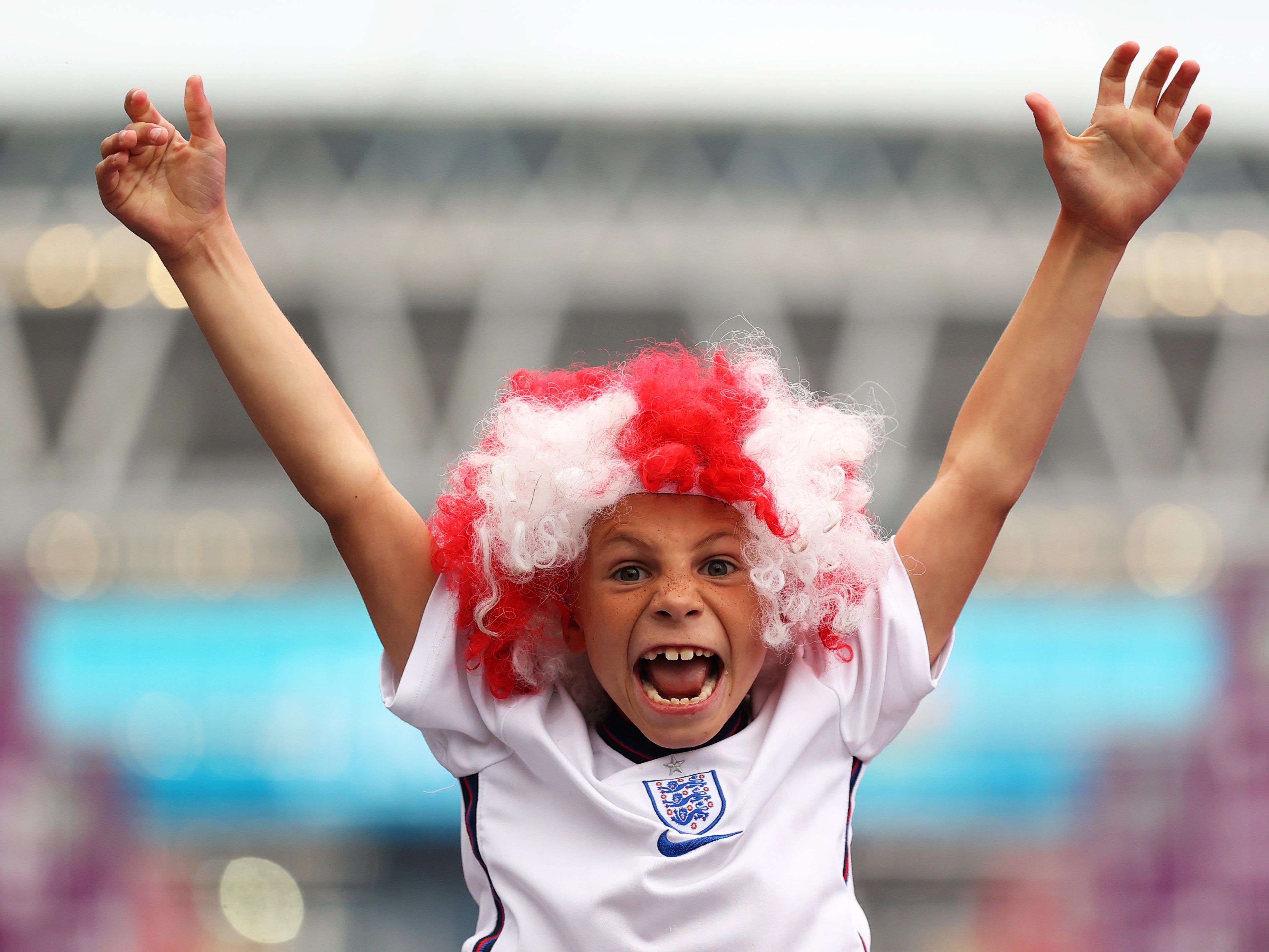 : A fan of England wearing a wig shows their support along Wembley Way prior to the UEFA Euro 2020 Championship Final
