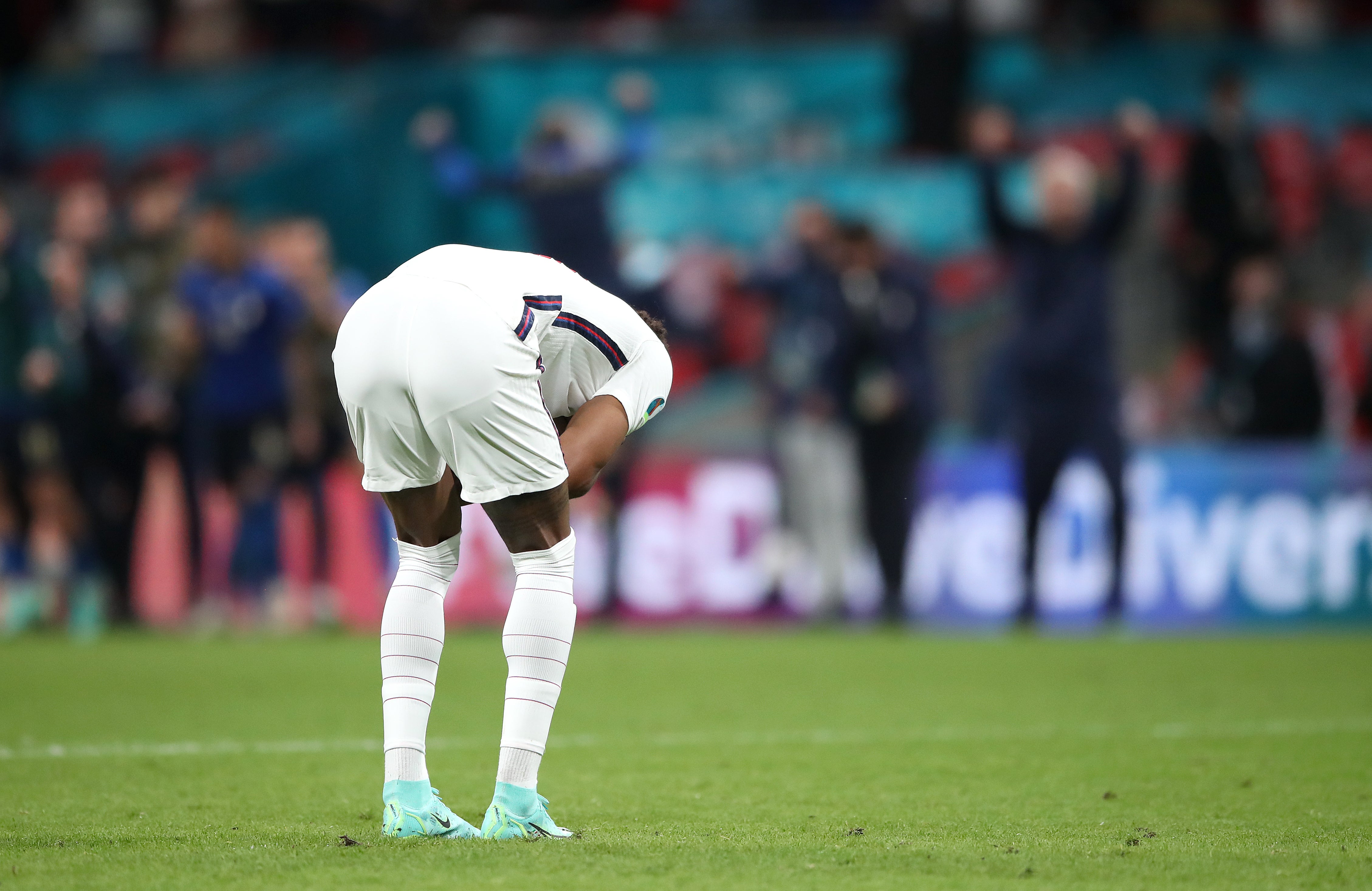 England’s Marcus Rashford reacts after missing in the penalty shoot-out