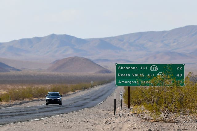 <p>File: A vehicle drives through Death Valley, California, on 11 July 2021 where temperatures hit more than 120 degrees this weekend</p>