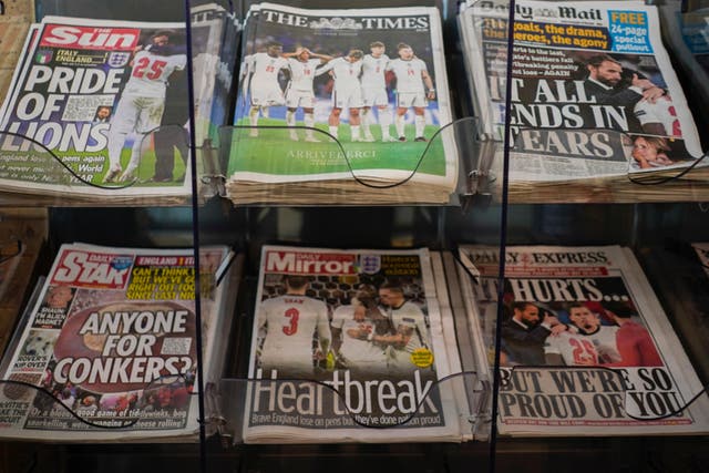 <p>Front pages of British newspapers are displayed at a newsagent in London on Monday 12 July 2021 after Italy beat England to win Euro 2020 at Wembley</p>