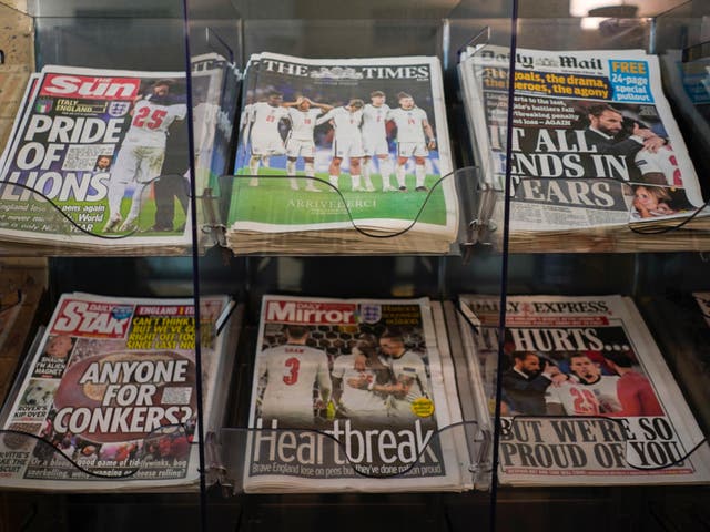 <p>Front pages of British newspapers are displayed at a newsagent in London on Monday 12 July 2021 after Italy beat England to win Euro 2020 at Wembley</p>