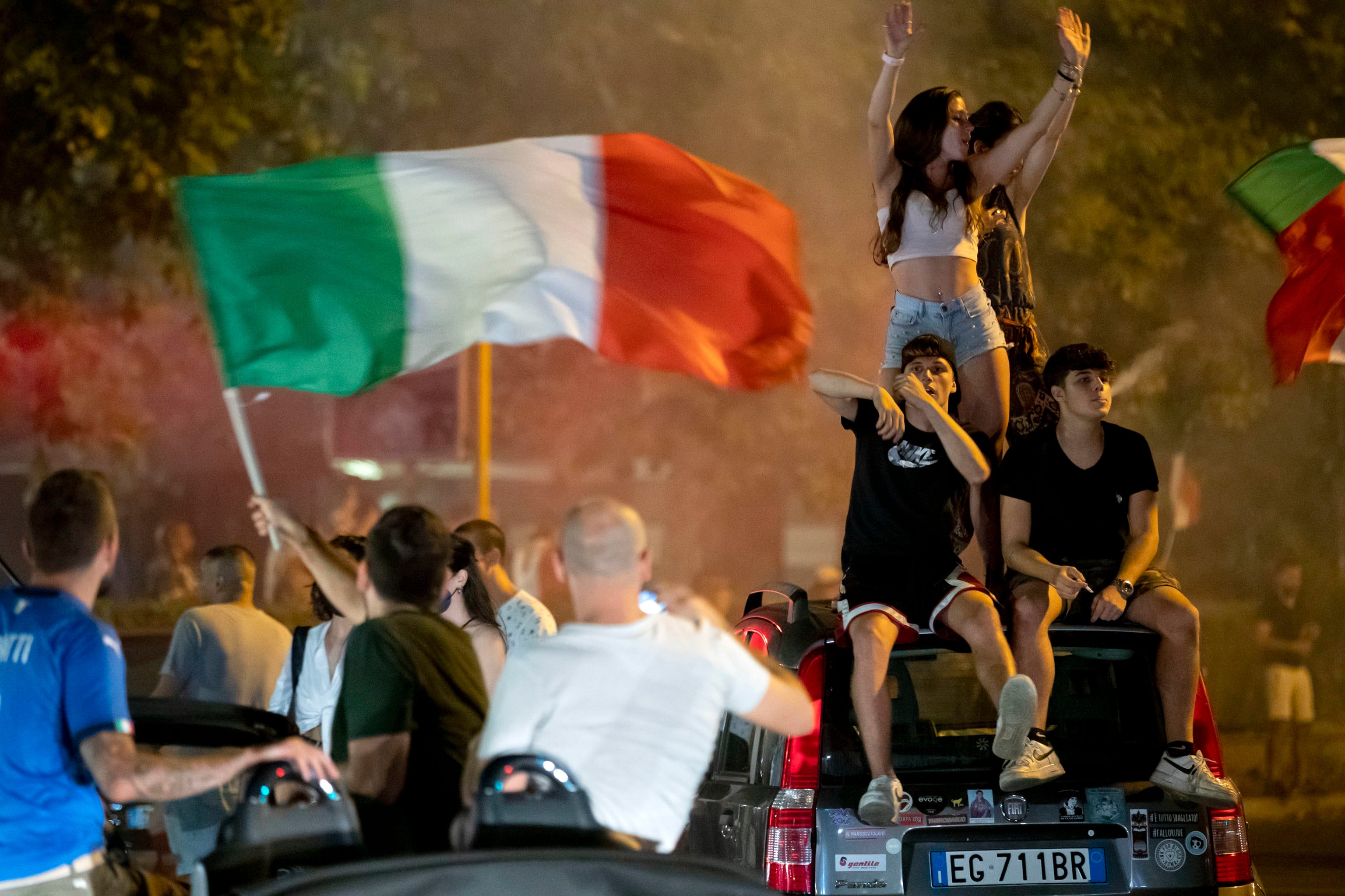 Italy’s supporters celebrate their team's victory