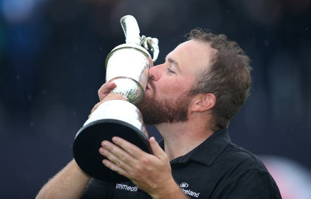 <p>Shane Lowry celebrates with the Claret Jug after winning the 2019 Open</p>
