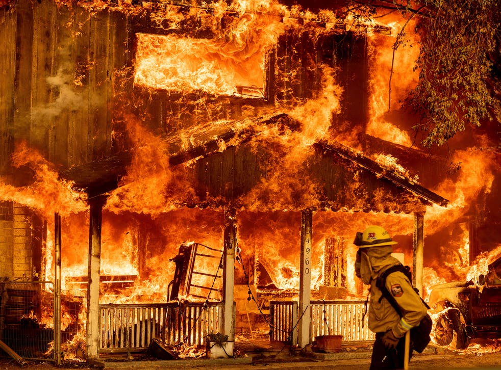 <p>Fire consumes a home as the Sugar Fire, part of the Beckwourth Complex Fire, tears through Doyle, Calif., on Saturday 10 July 2021</p>