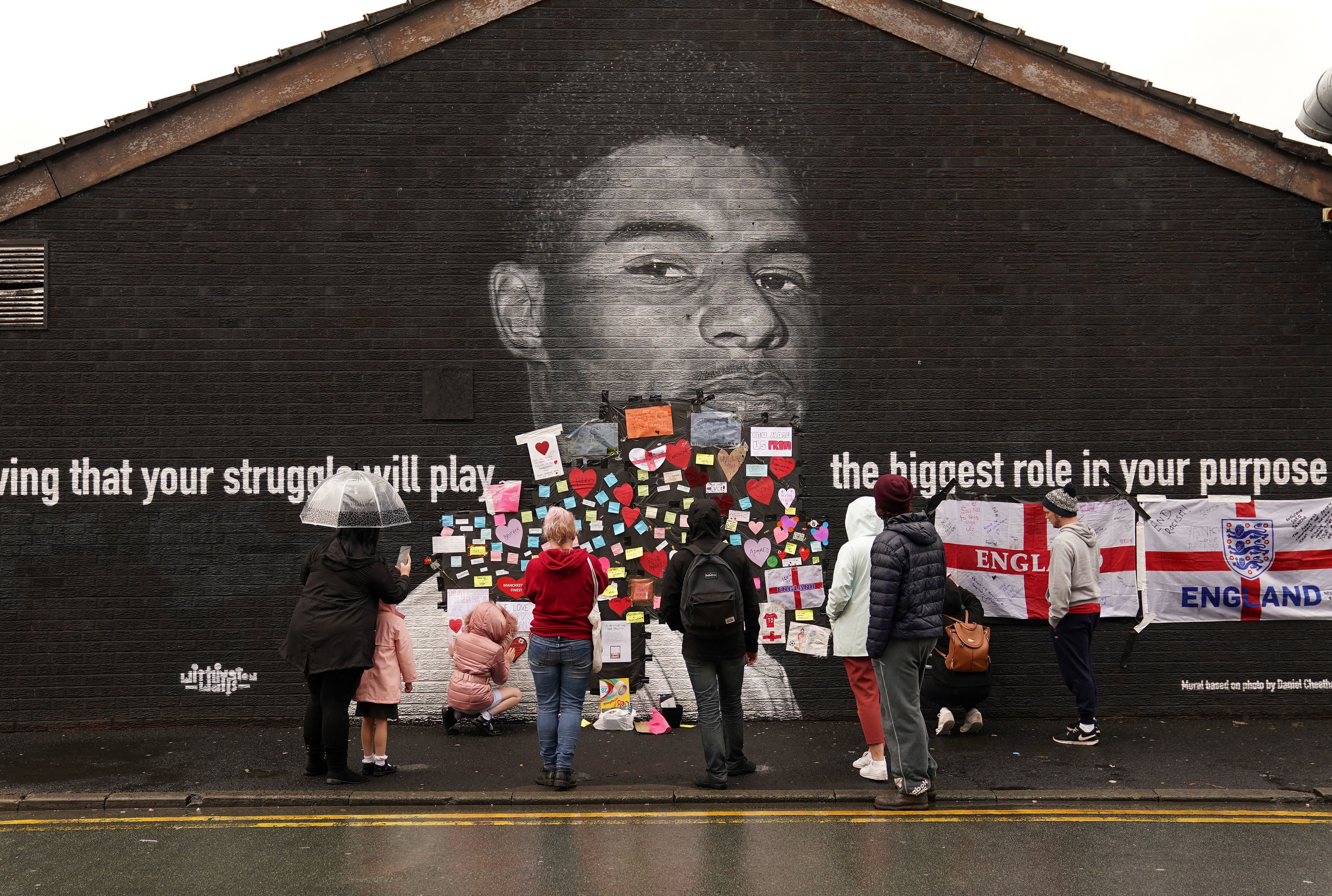 Residents continued to post messages support at the mural throughout the day