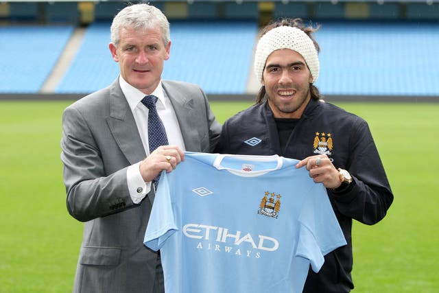 Carlos Tevez, right, joined Manchester City under manager Mark Hughes in 2009