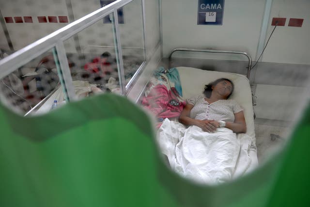 <p>A patient suffering from the Guillain-Barre neurological syndrome recovers in the neurology ward of the Rosales National Hospital in San Salvador, on 27 January, 2016</p>