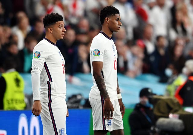 <p>Marcus Rashford (right) and Jadon Sancho, along with Bukayo Saka, were targeted for missing penalties during the shootout in the Euro 2020 final against Italy</p>