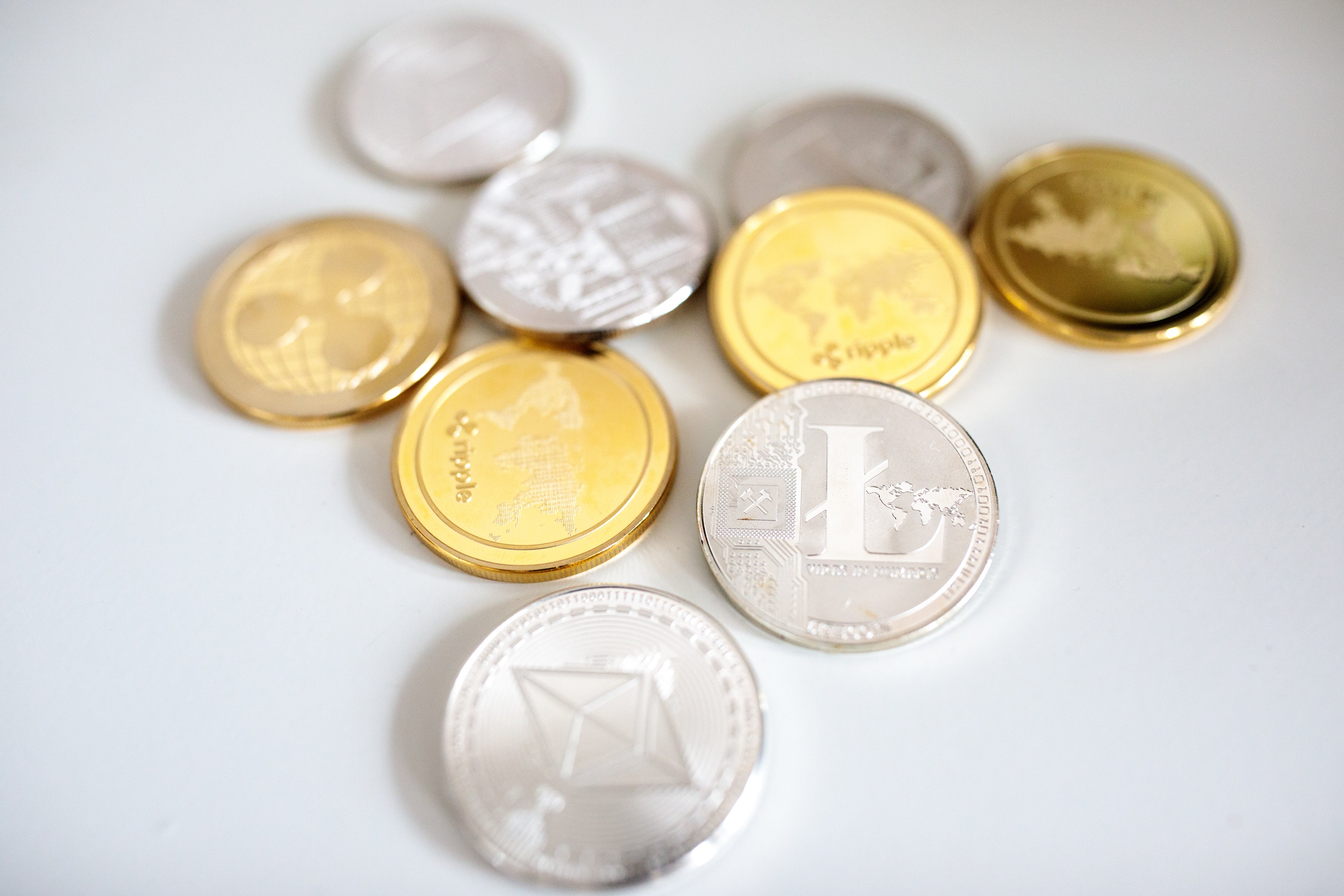 Types of cryptocurrency include Bitcoin, Dogecoin and Ethereum
