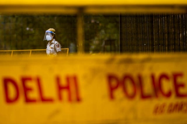 <p>A police officer stands guard at a roadblock in Delhi on 20 April, 2021. Representative image. </p>