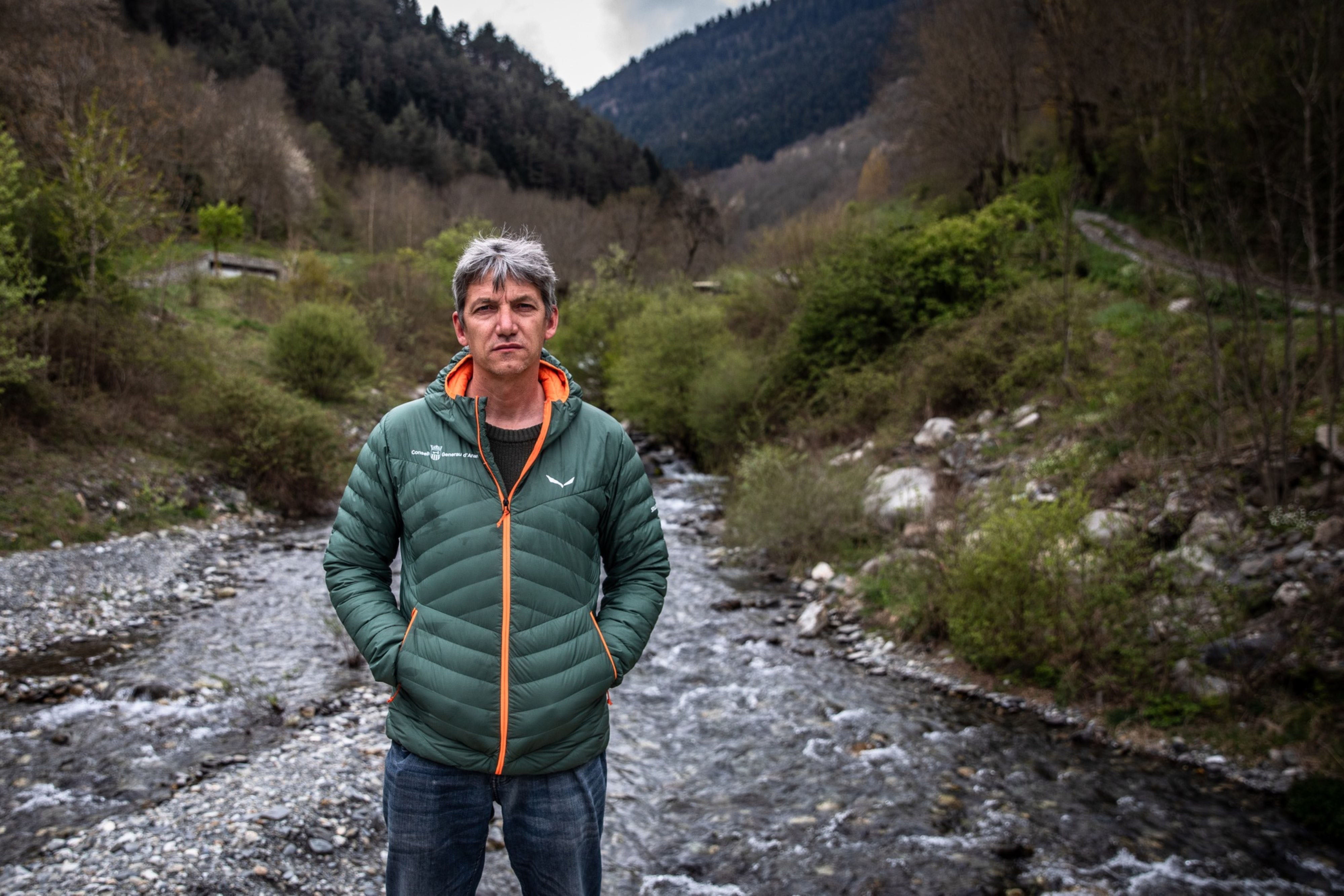 Ivan Afonso, an environmental scientist, by a river bed in Vielha, Spain