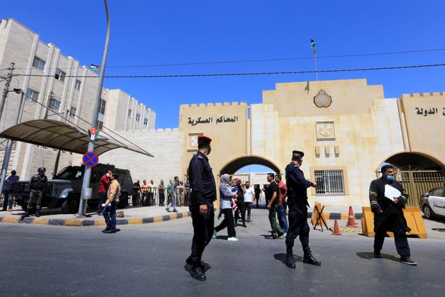 <p>Officers stand guard outside Jordan's State Security Court</p>