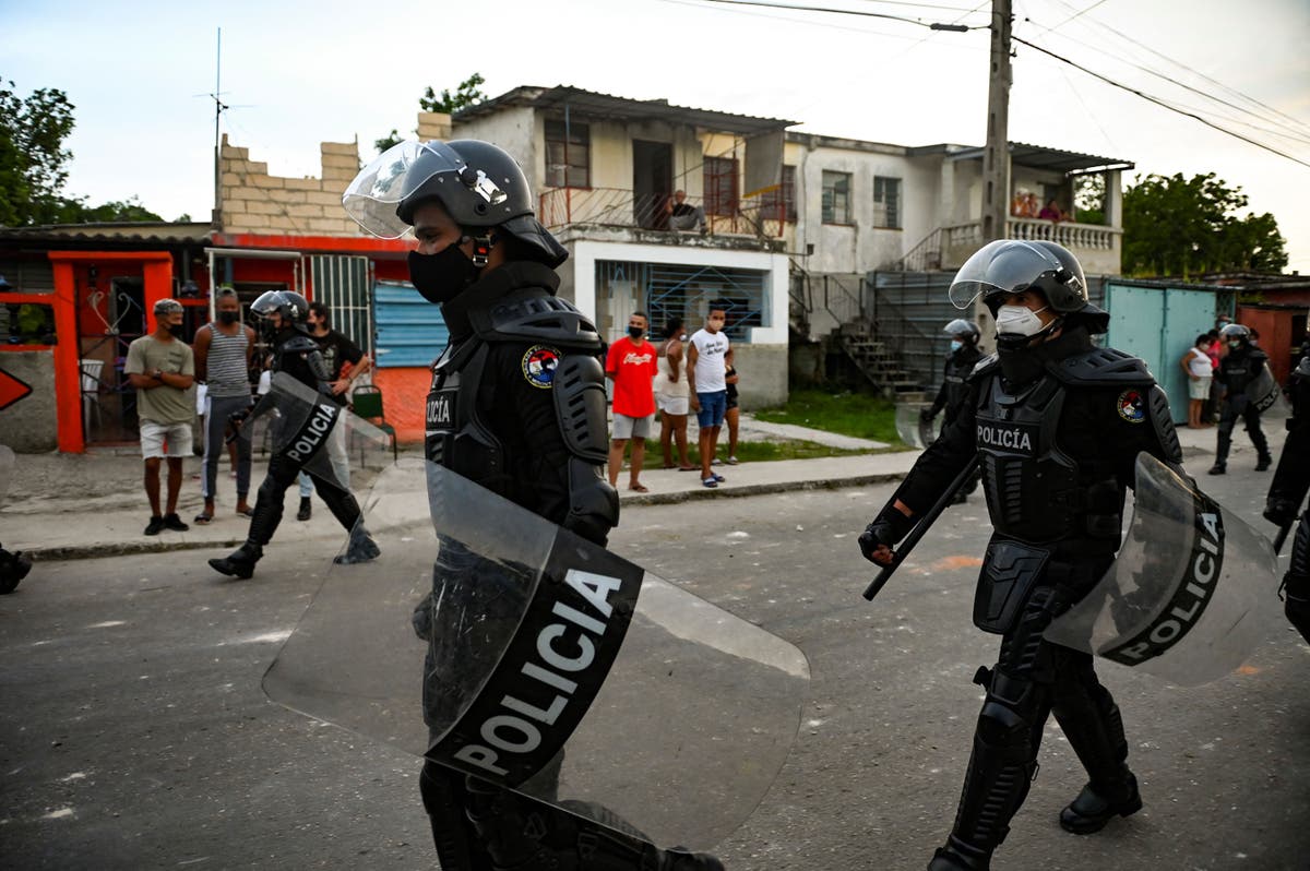 Video shows Cuban protester being shot by police in front of his family | The Independent