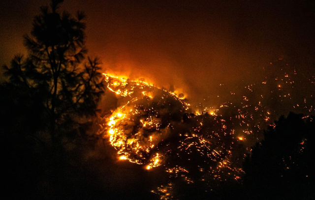 <p>Fire burning overnight near the entrance of Yosemite National Park in California</p>