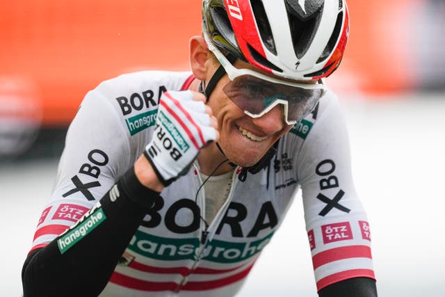 <p>Patrick Konrad celebrates winning stage 16</p>