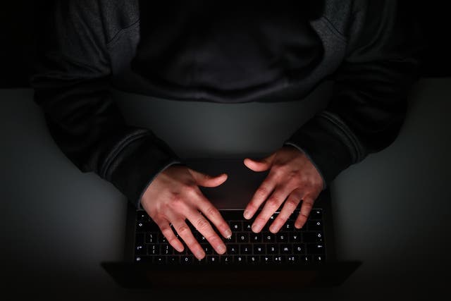 Man uses laptop