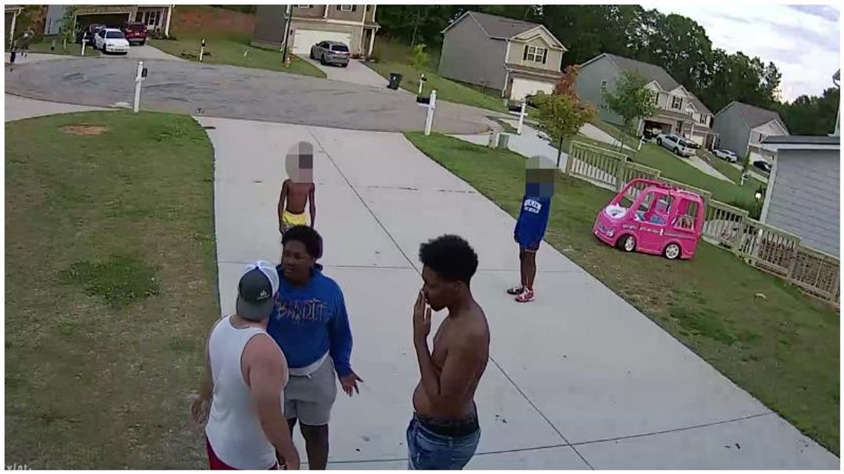 A Black teenager was allegedly attacked by a white neighbour with a belt while he was playing basketball with his cousins
