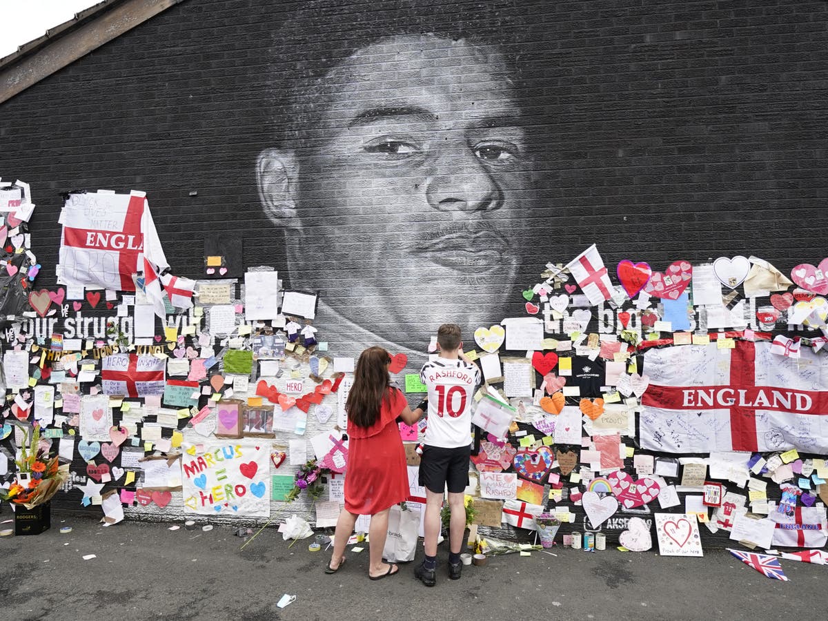 Ban online racists from football grounds, Labour tells government