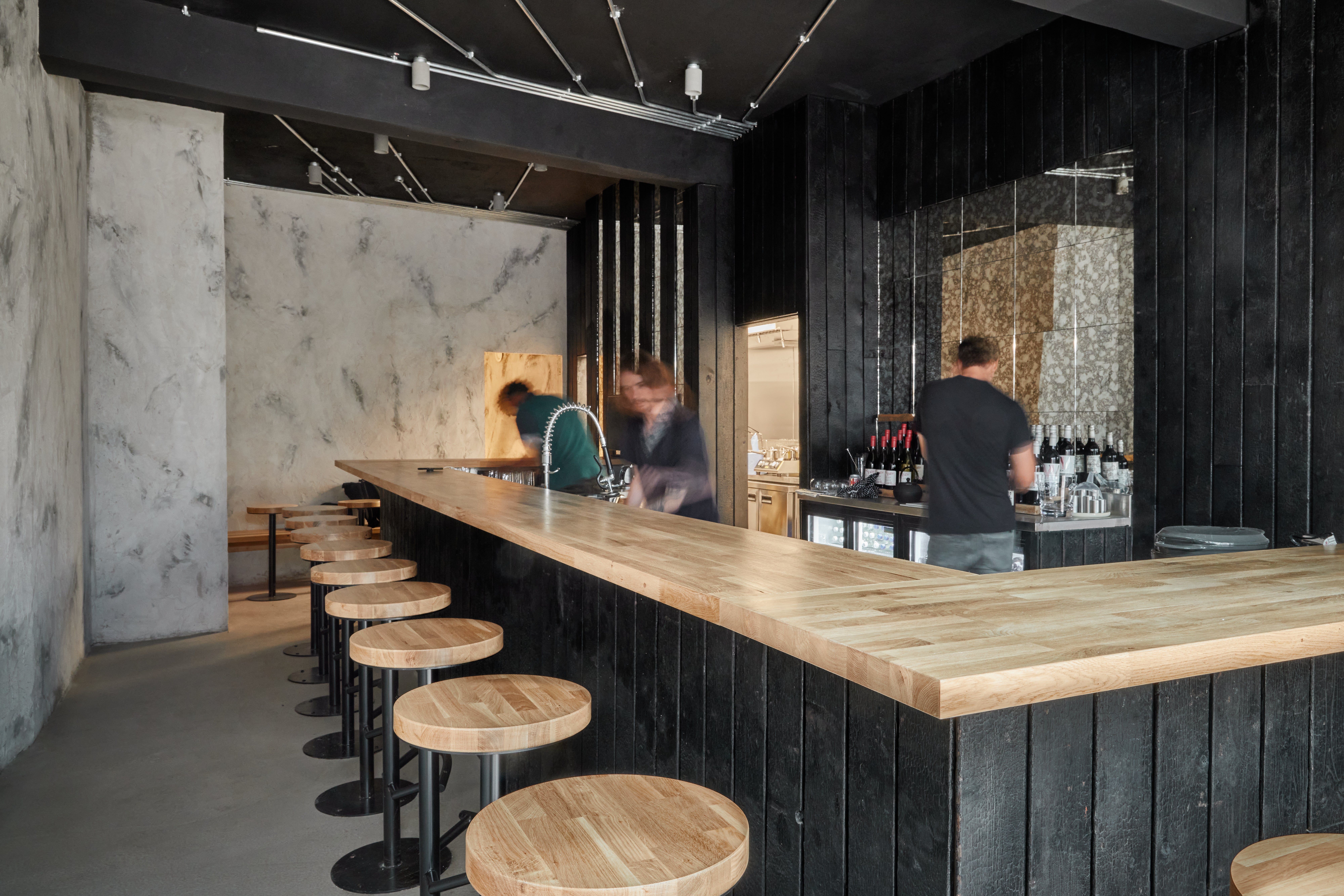 The counter-style seating echoes the style of Japanese restaurants found in New Zealand
