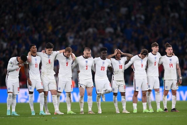 <p>England players look on during the penalty shoot out during the UEFA Euro 2020 Championship final against Italy</p>