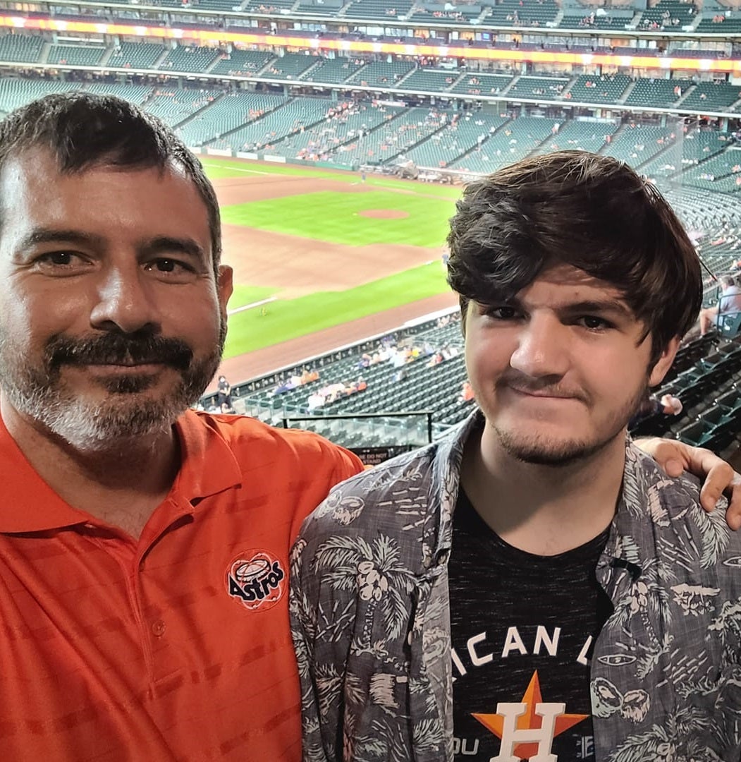 One of the last photos of Paul Castro and his son David, taken at the Houston Astros game before the road rage shooting