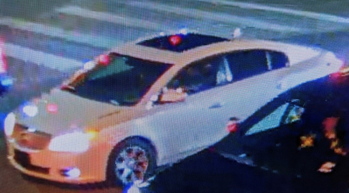 A white, Buick LaCrosse driven by the man wanted in the road rage shooting of David Castro