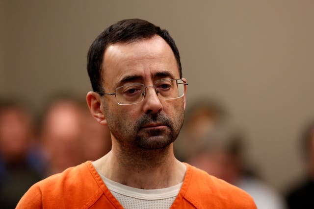 <p>Former Michigan State University and USA Gymnastics doctor Larry Nassar appears at Ingham County Circuit Court on November 22, 2017 in Lansing, Michigan. F</p>