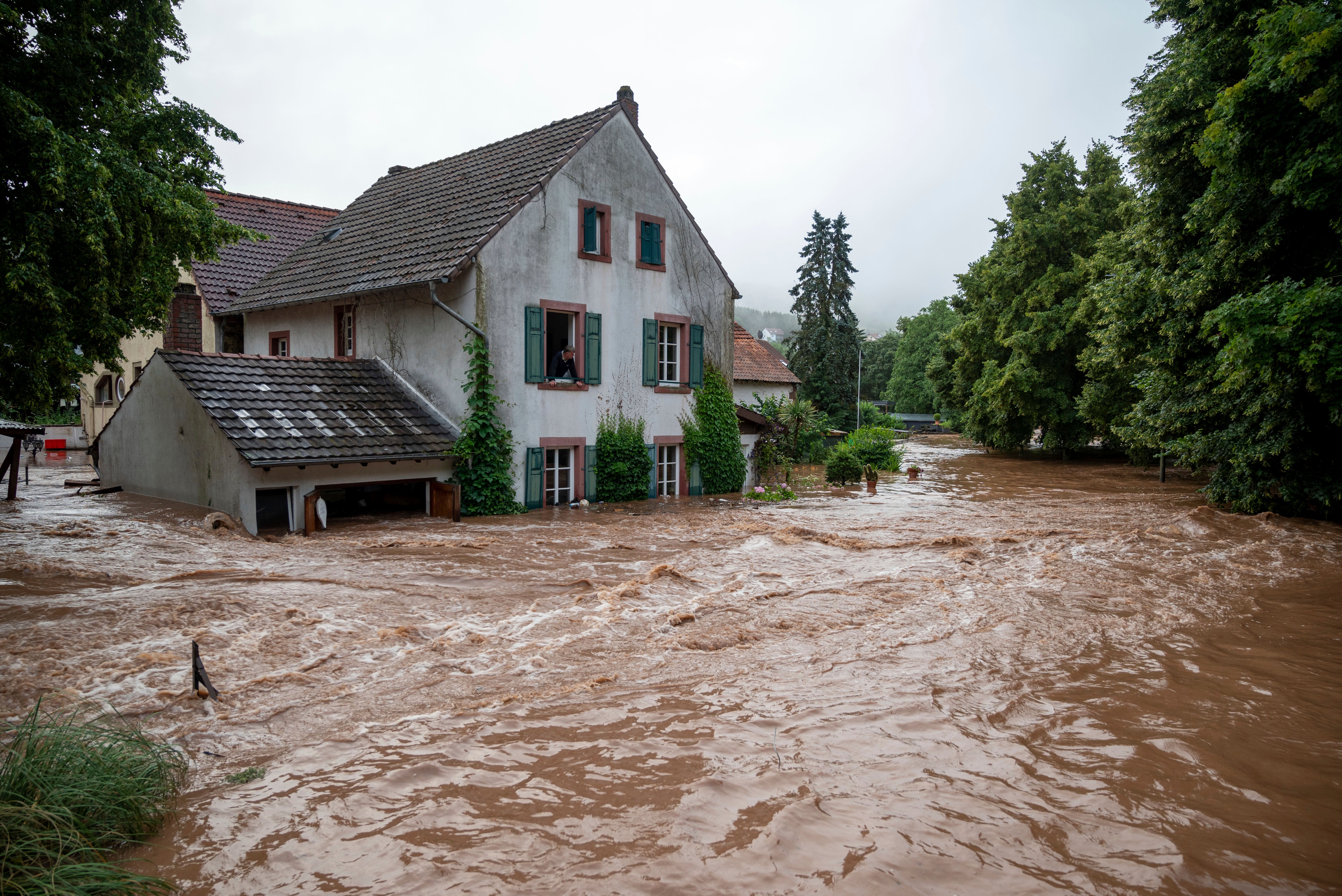 Houses are submerged by the overflowing river banks in Erdorf, Rhineland-Palatinate