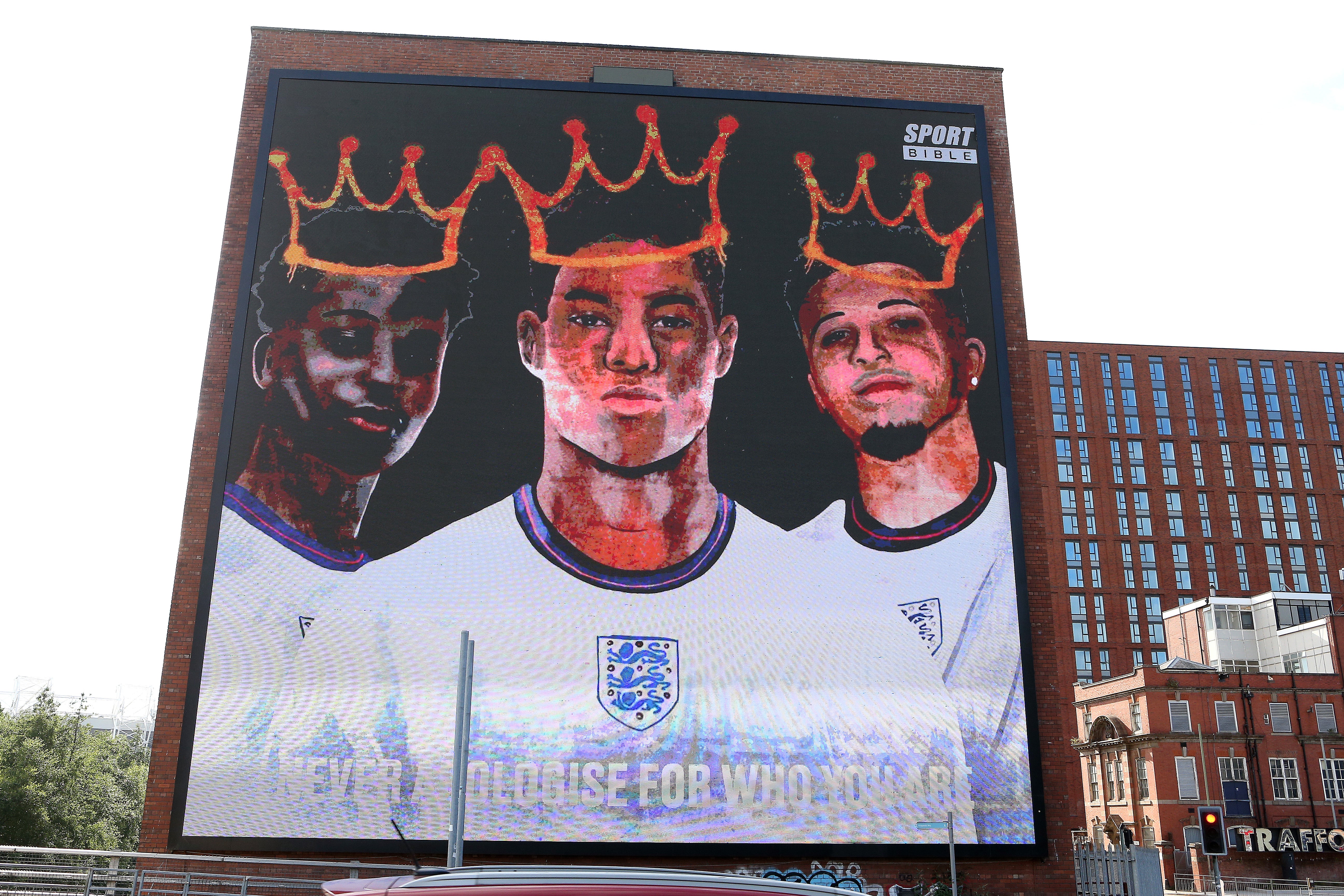 A giant mural in support of the three England footballers Marcus Rashford, Jadon Sancho and Bukayo Saka has been unveiled in Manchester