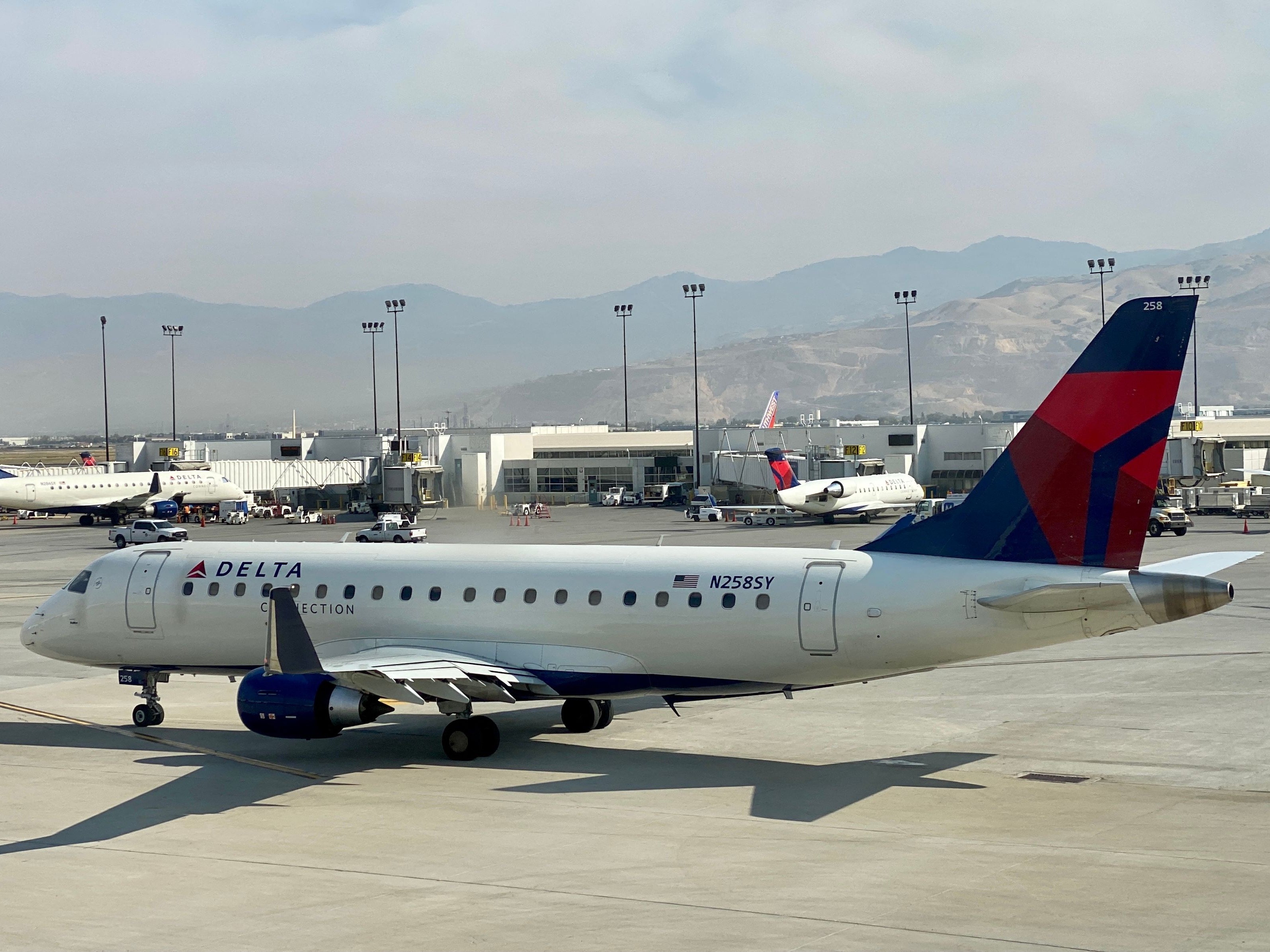 In this file photo a Delta Airlines plane is seen at the gate at Salt Lake City International Airport (SLC), Utah, on 5 October 2020