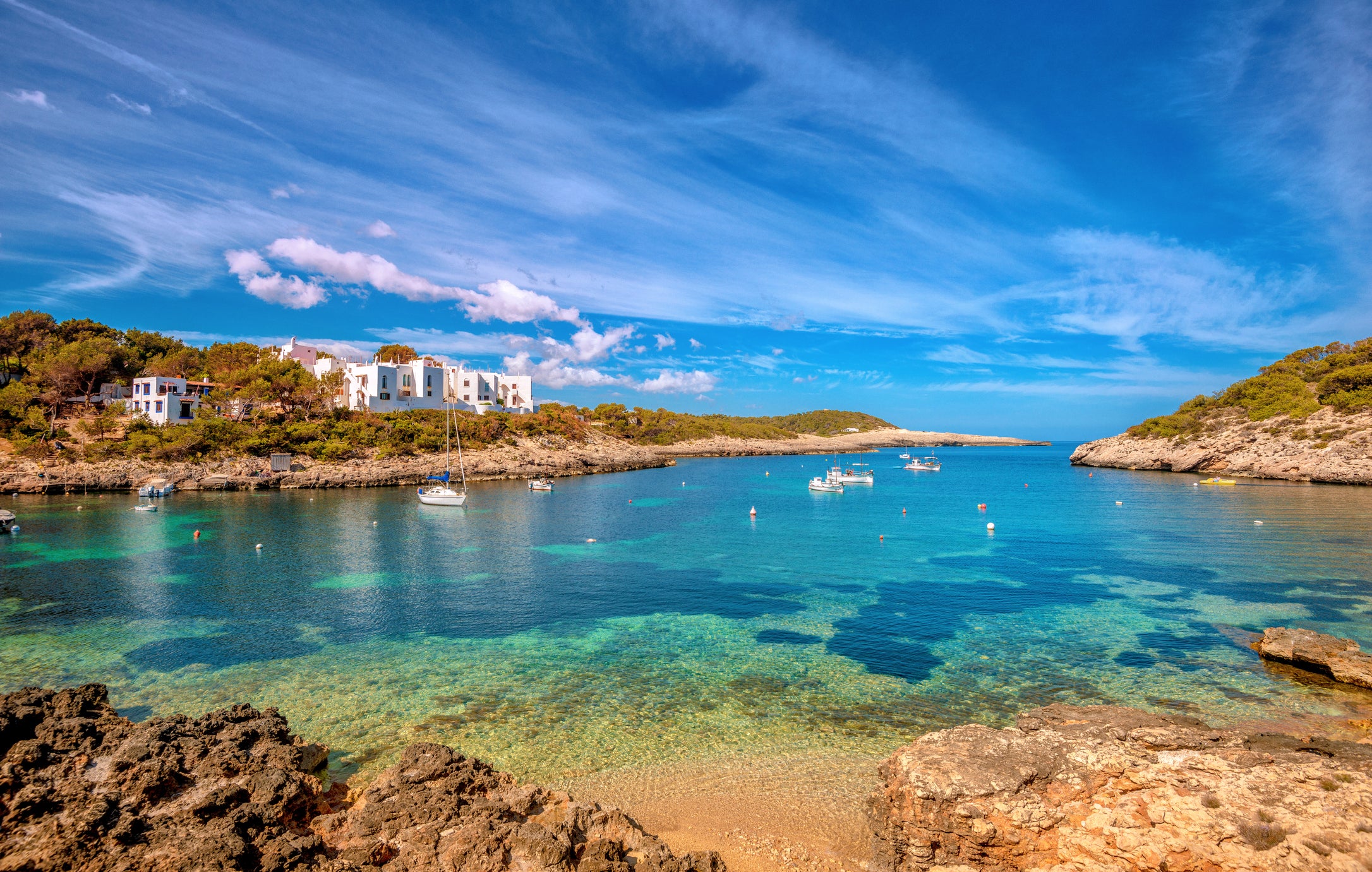 The bay of Portinatx in Ibiza, one of the country’s related to the amber list