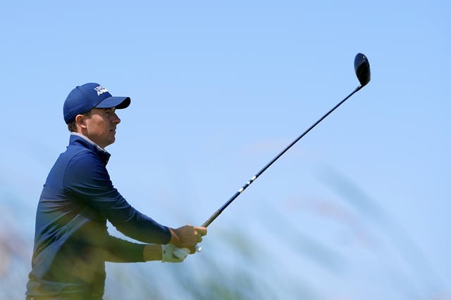 <p>Jordan Spieth tees off with his driver</p>