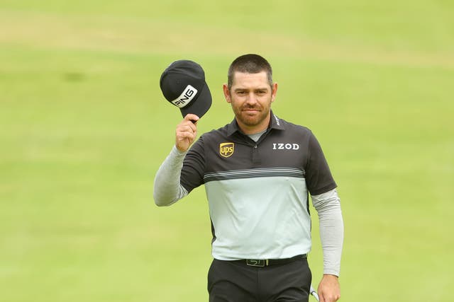 <p>Louis Oosthuizen walks up the 18th on day one</p>
