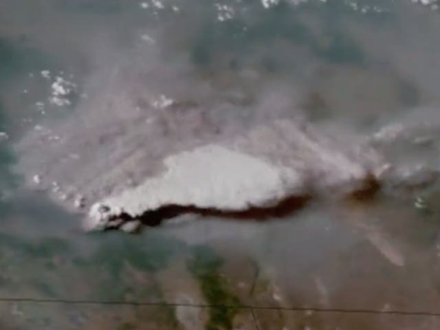 <p>Dramatic satellite footage recorded by the National Oceanic and Atmospheric Administration (NOAA) has shown the extent of the smoke spreading from above</p>