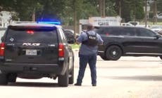 Police officer killed and three hospitalised in armed standoff with man barricaded in Texas house