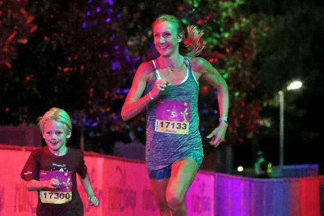 Paula Radcliffe runs with her son Raphael