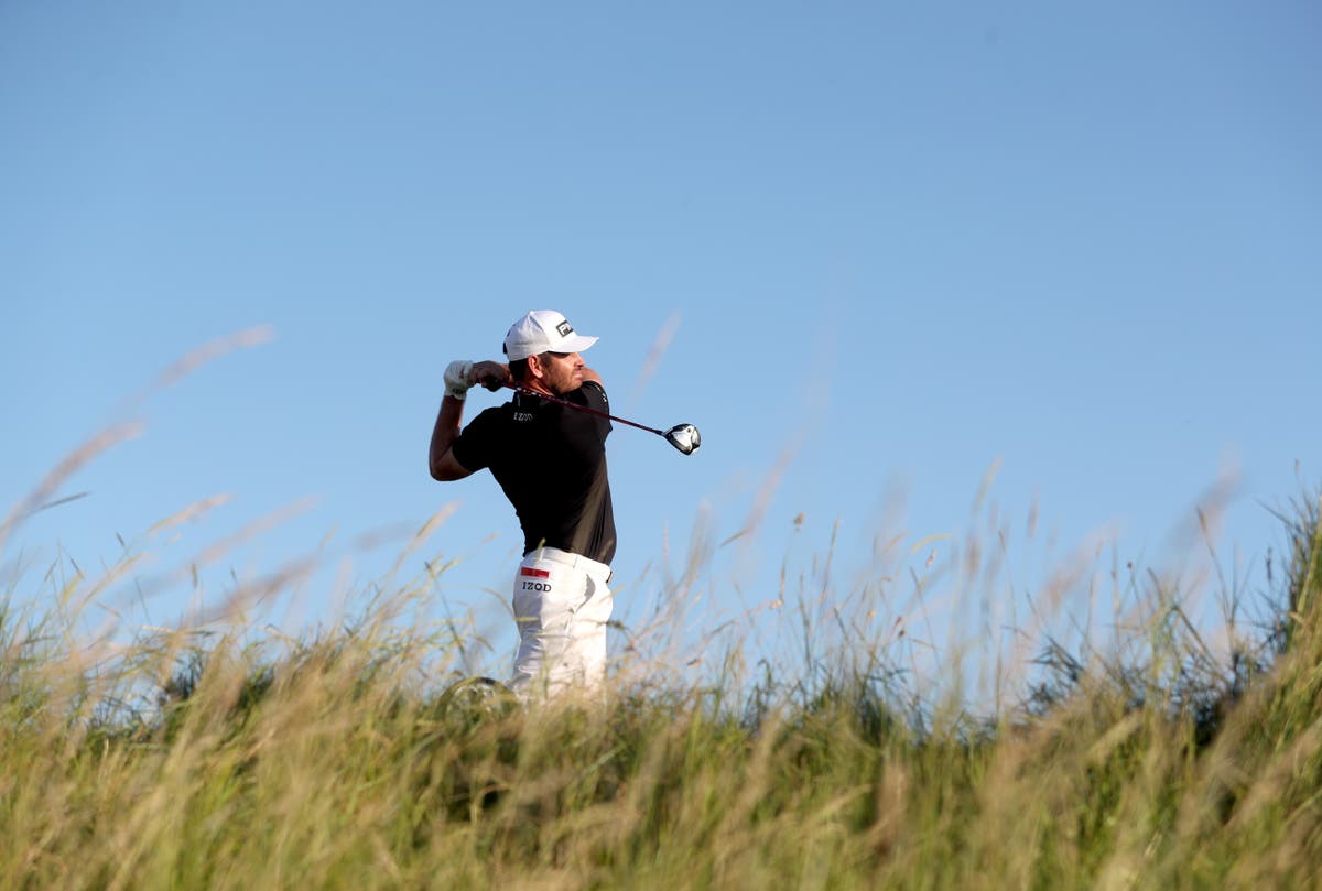 Record-breaking halfway total earns Louis Oosthuizen two-shot Open lead