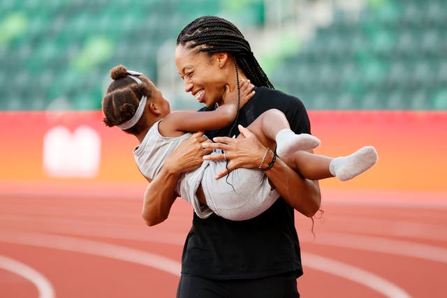 <p>Allyson Felix celebrates with her daughter Camryn after day nine of the 2020 U.S. Olympic Track & Field Team Trials at Hayward Field on June 26, 2021 in Eugene, Oregon</p>