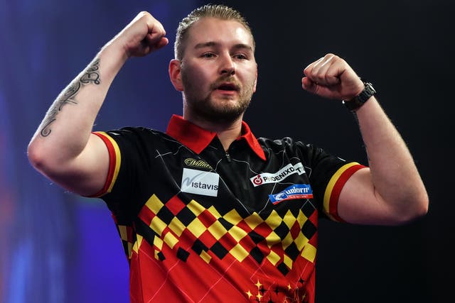 <p>Dimitri van den Bergh is through to the second round of the World Matchplay</p>