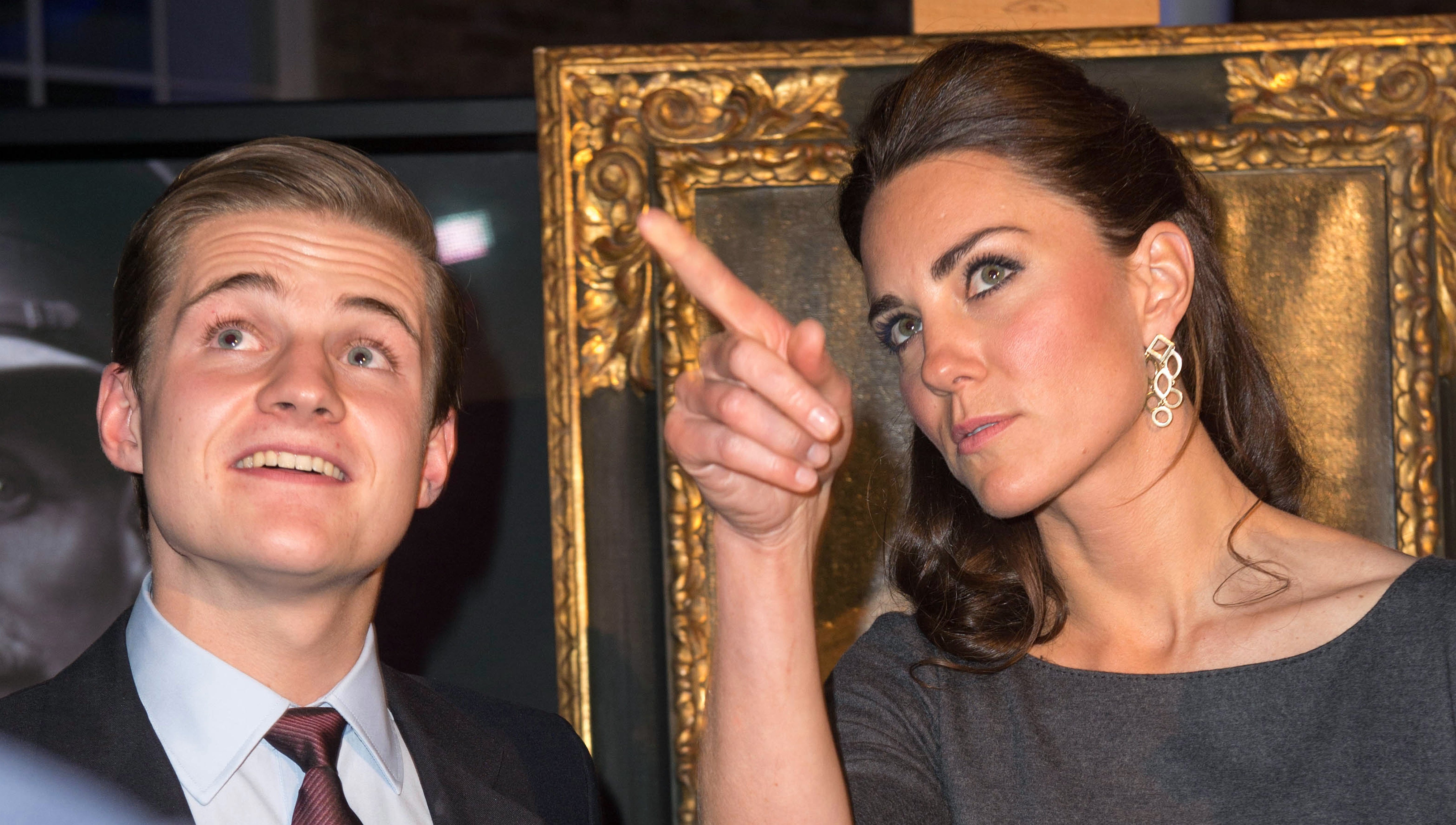 The Duchess of Cambridge speaks with Vere Rothermere, widely expected to take up the reins after his father, during a visit to the Imperial War Museum in 2012