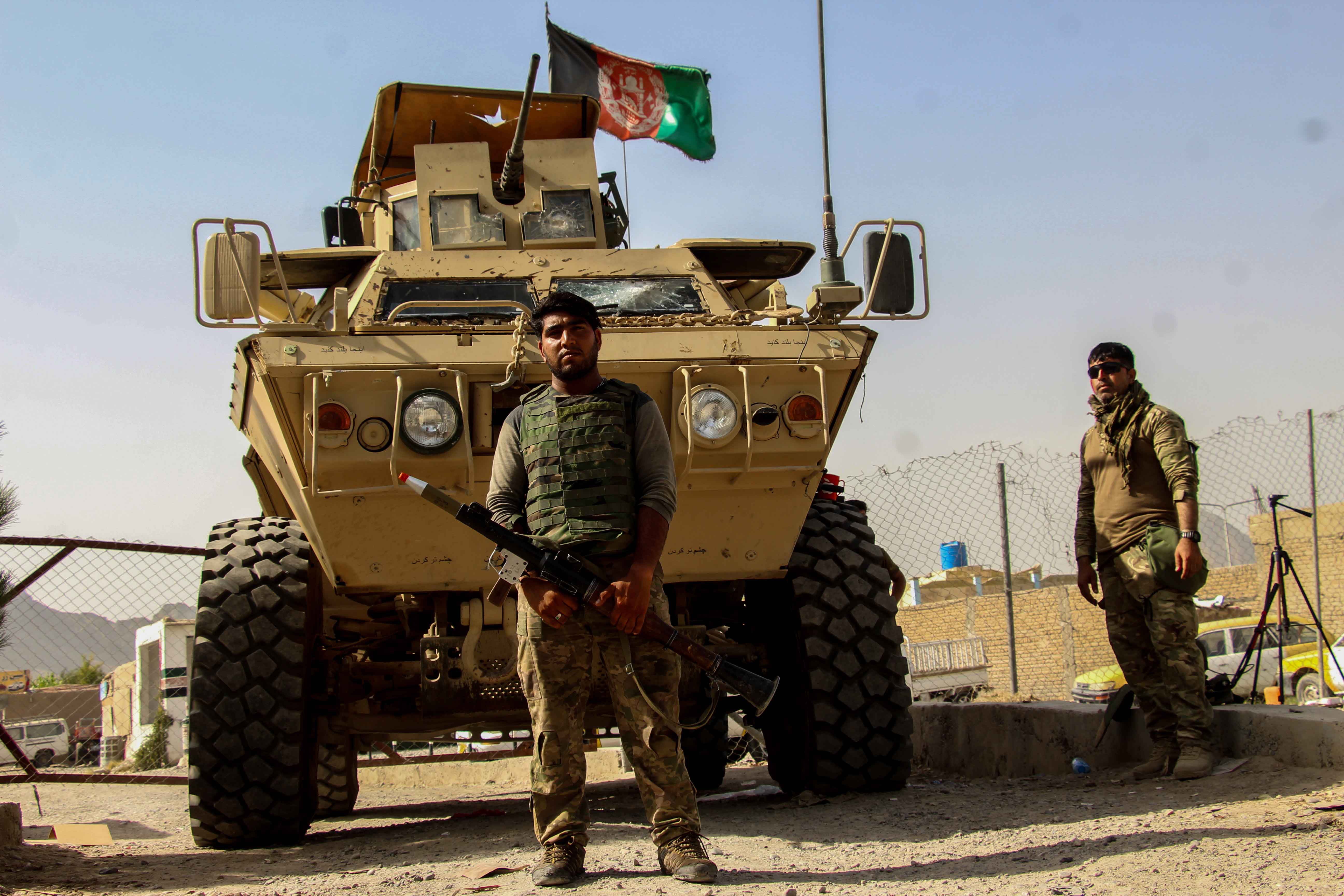 Afghan security forces near the Spin Boldak crossing in Kandahar province on the border with Pakistan. The Talban captured a district in the region and raised its flag at the checkpoint last week