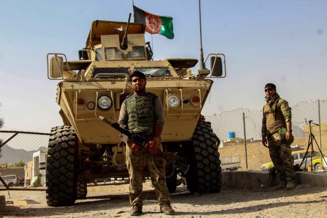 <p>Afghan security forces near the Spin Boldak crossing in Kandahar province on the border with Pakistan. The Talban captured a district in the region and raised its flag at the checkpoint last week</p>