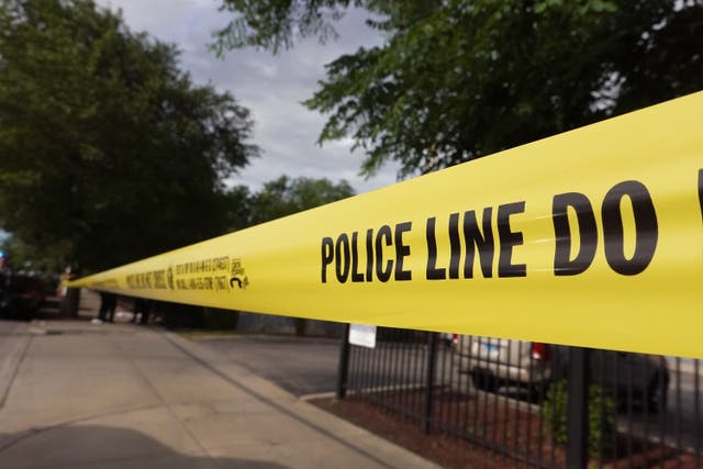 <p>File: Police tape surrounds a crime scene where three people were shot on 23 June 2021 in Chicago</p>