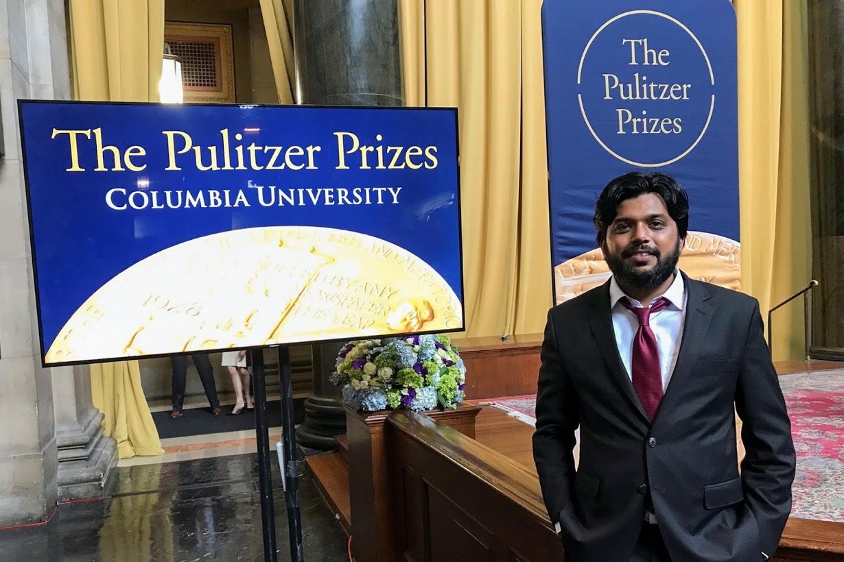 Siddiqui poses for a picture at Columbia University’s Low Memorial Library during the Pulitzer Prize giving ceremony in New York in 2018