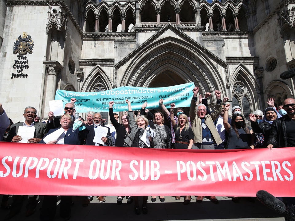 Former post office workers celebrating after their convictions were overturned by the Court of Appeal in April