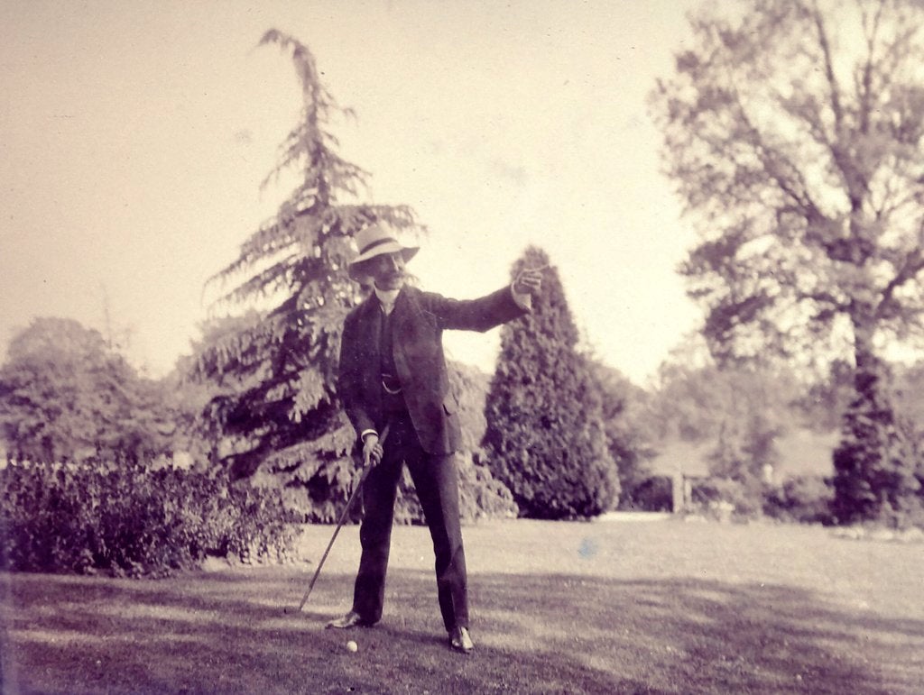 Photographer Sidney Fletcher, it is thought, being photographed playing golf