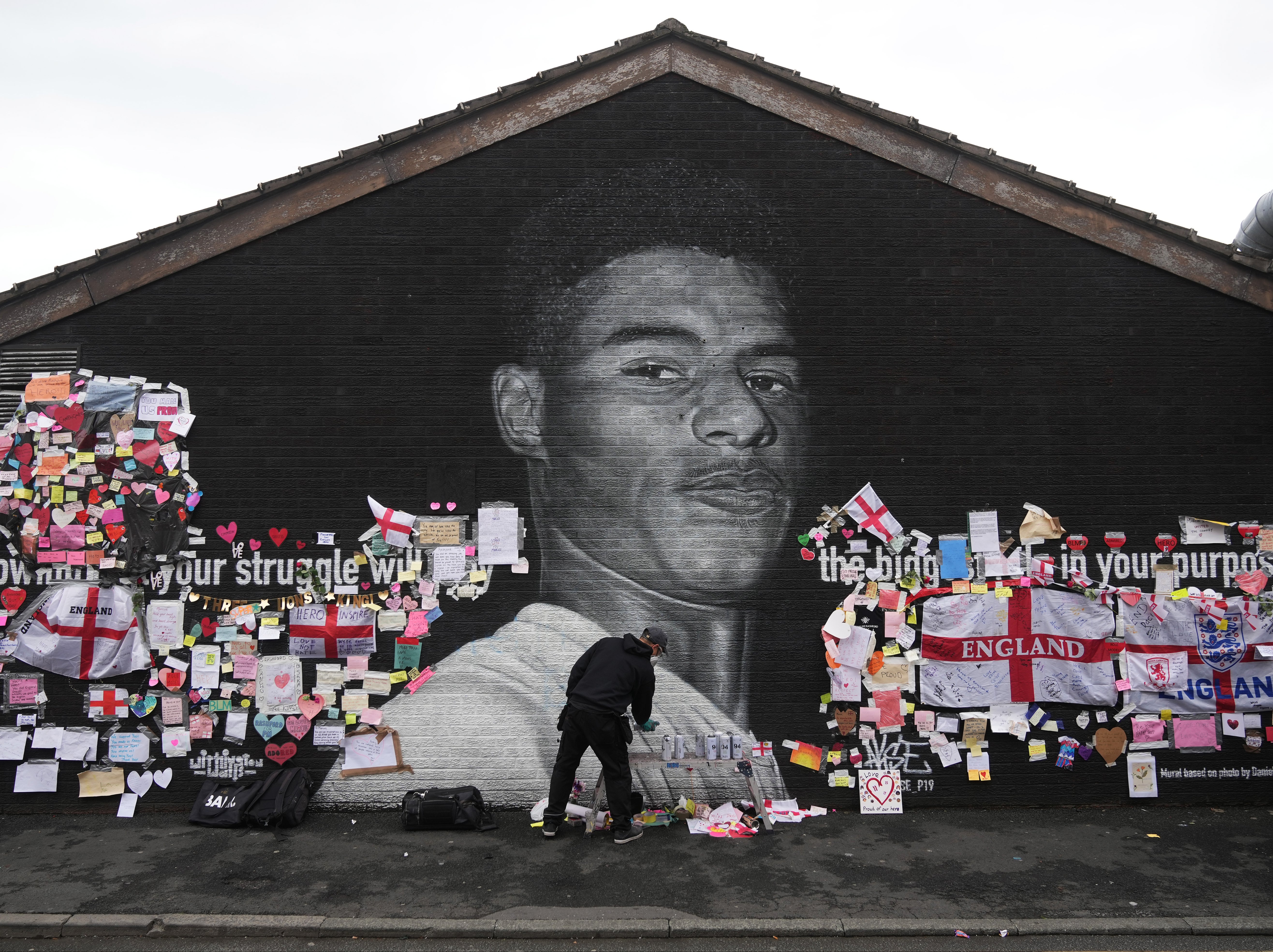 The Marcus Rashford mural is repaired after being defaced by vandals